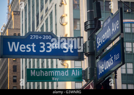 New York commemorates the late boxing legend Muhammad Ali by temporarily renaming West 33rd Street next to Madison Square Garden as 'Muhammad Ali Way', seen on Tuesday, June 7, 2016. Ali fought Joe Frazier in the famous arena in 1971 in what was billed as the 'Fight of the Century'. Ali passed away June 3 at the age of 74. (© Richard B. Levine) Stock Photo