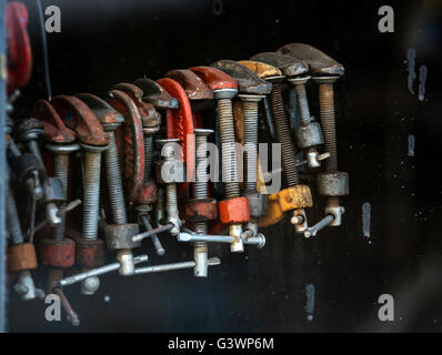 Set of old vise in a workshop. Stock Photo