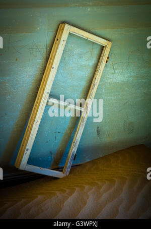 Kolmanskop (Afrikaans for Coleman's hill, German: Kolmannskuppe) is a ghost town in the Namib desert in southern Namibia. Stock Photo