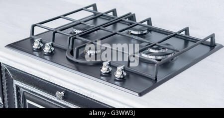 the New and modern shining metal gas cooker Stock Photo