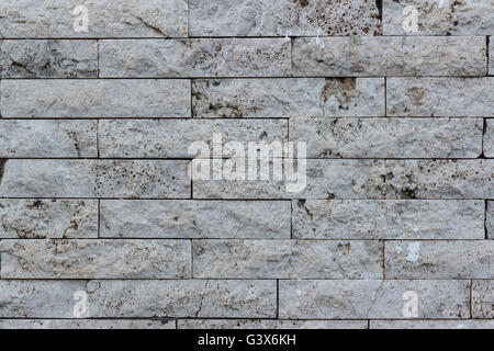 Wall of bricks in Vulcanic Stone, useful for background. Stock Photo