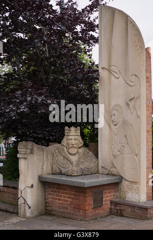 Statue of King John sealing the Magna Carta in Egham, Surrey UK Stock Photo