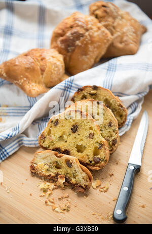 Traditional  Cypriot easter cheese pastries, flaounes and knife. Stock Photo