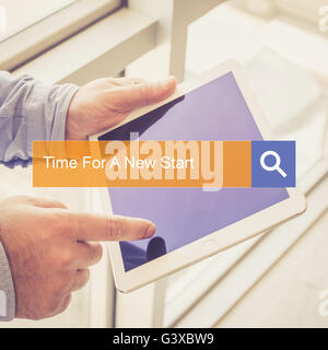 SEARCH TECHNOLOGY COMMUNICATION  Time For A New Start TABLET FINDING CONCEPT Stock Photo
