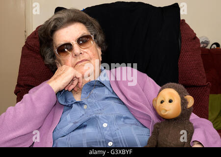 94-year old woman suffering with Dementia. Stock Photo