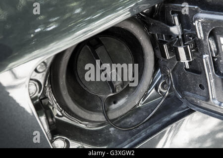 Modern car details, closed fuel cap. Closeup photo with selective focus Stock Photo