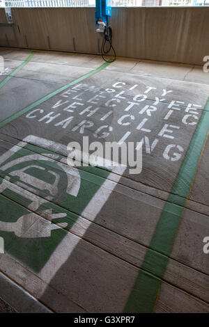 City employee parking space reserved for charging of electric vehicles, Indianapolis  Indiana. Stock Photo