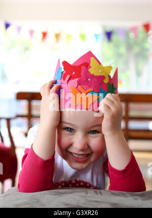 Child with party hat being silly Stock Photo
