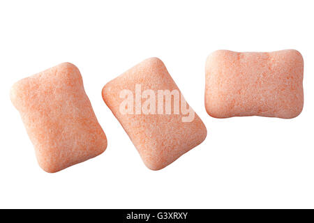 Peach clolor chewing gum isolated on white Stock Photo