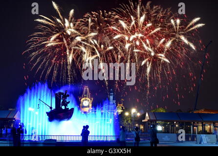 Shanghai. 14th June, 2016. Photo taken on June 14, 2016 shows firework and light show at the Shanghai Disney Resort in Shanghai, east China. The Shanghai Disney Resort, the sixth in the world, will officially open on June 16. © Cai Yaofang/Xinhua/Alamy Live News Stock Photo