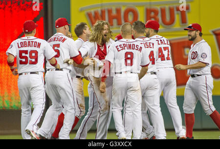 Washington, District of Columbia, USA. 15th June, 2016. Washington Nationals left fielder Jayson Werth (28) and his teammates celebrate the long single that scored Michael A. Taylor from first to beat the Chicago Cubs 5 - 4 in the 12th inning at Nationals Park in Washington, DC on Wednesday, June 15, 2016. Credit: Ron Sachs/CNP Credit:  Ron Sachs/CNP/ZUMA Wire/Alamy Live News Stock Photo