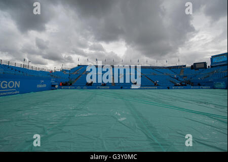 The Queen’s Club, London UK. 16th June 2016. Day 4 of grass court championships at the west London club, the great British summer of torrential rain stops practice sessions and courts are covered. Credit:  sportsimages/Alamy Live News. Stock Photo