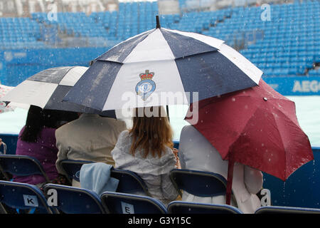 Queens Club, London, UK. 16th June, 2016. Aegon Queens Tennis Championships Day Four. Heavy rain in west London delays play at the start of day 4 of the torunament. Credit:  Action Plus Sports/Alamy Live News Stock Photo