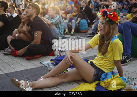 Kiev, Ukraine. 16th June, 2016. Ukrainian fans watch the UEFA EURO 2016 group C preliminary round match between Ukraine and Northern Ireland at the fan zone in Kiev, Ukraine, 16 June 2016. The UEFA EURO 2016 soccer championship takes place from 10 June to 10 July 2016 in France. Credit:  Nazar Furyk/ZUMA Wire/Alamy Live News Stock Photo