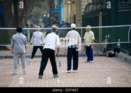 People playing badminton on the street, Hanoi, Vietnam, Southeast Asia, Asia Stock Photo