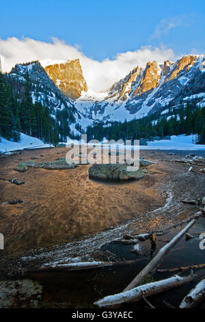 Hallett and Flattop peaks basking in the warm sunlight of the morning sunrise in Rocky Mountain National Park Stock Photo