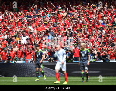Wales supporters in the stands during the UEFA Euro 2016, Group B match at the Stade Felix Bollaert-Delelis, Lens. Stock Photo