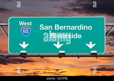 San Bernardino Riverside Interstate 10 west highway sign with sunrise sky. Stock Photo