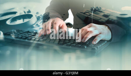 Man hands typing on computer keyboard Stock Photo