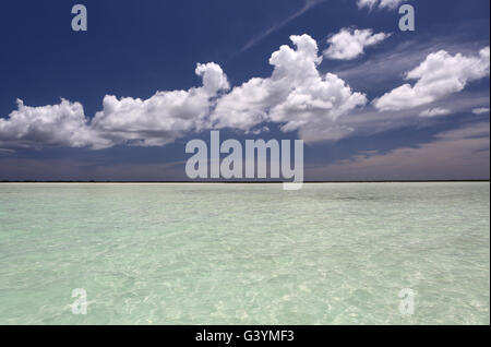 Blue sky and fluffy clouds over lagoon, Christmas Island, Kiribati Stock Photo