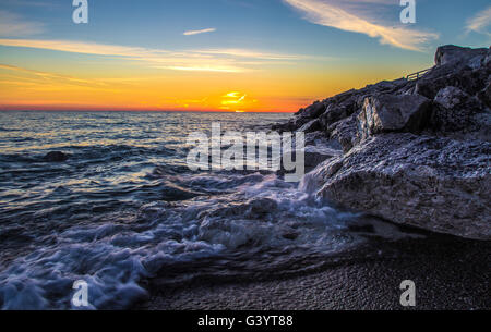 Sunrise Over Rocky Lake Michigan Shoreline Cave Point County Park Door ...