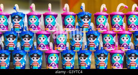 Drinks and drink cartons with straws for sale in shop display Stock Photo