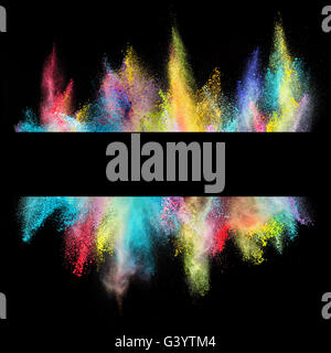 Explosion of colored powder with empty space for text, isolated on black background Stock Photo