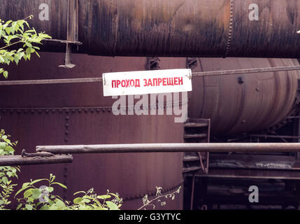 The sign - Passage forbidden - on Russian language. Mining and metallurgical plant Stock Photo