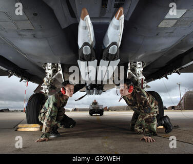 Guided Bombs Are Loaded On A F 15E "Strike Eagle" Fighter-bomber In The ...