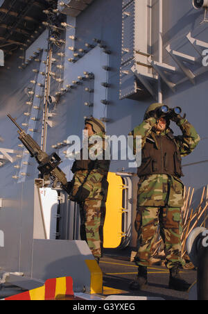 Soldiers provide security aboard USS Harry S. Truman. Stock Photo