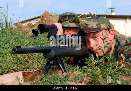 U.S. Air Force Soldiers practice their sniper skills. Stock Photo