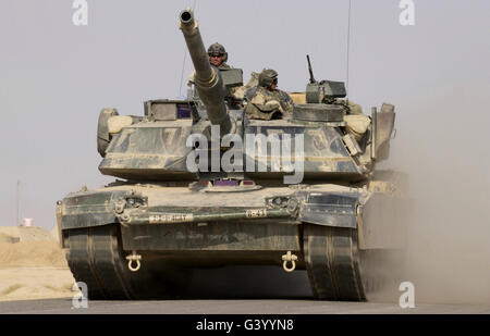 An M1A1 Abrams tank heading out on a mission from Forward Operating Base MacKenzie in Iraq. Stock Photo