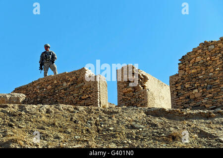 U.S. Army soldier stands guard in Afghanistan. Stock Photo