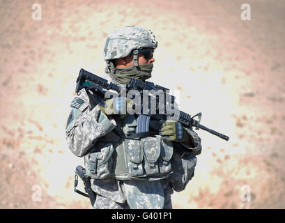 An Army soldier stands guard while near Qalat, Afghanistan. Stock Photo