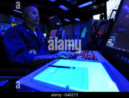 Air Traffic Controller stands watch aboard USS George H.W. Bush. Stock Photo