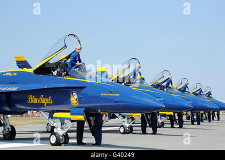 Pilots of the Blue Angels Flight Demonstration Team stand in the cockpit of their F/A-18 Hornet. Stock Photo