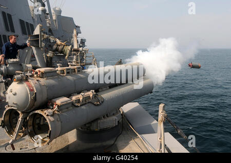 A MK-46 recoverable exercise torpedo is launched from an Arleigh Burke ...