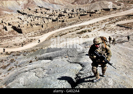 U.S. Army soldiers and Afghan Border Patrolmen provide security  in Afghanistan. Stock Photo