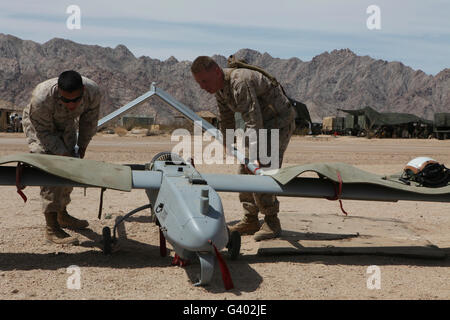 Marines move an RQ-7 Shadow unmanned aerial vehicle. Stock Photo