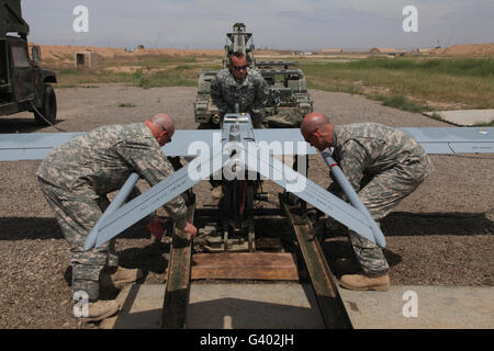 U.S. Army soldiers prepare to launch an RQ-7B Shadow. Stock Photo