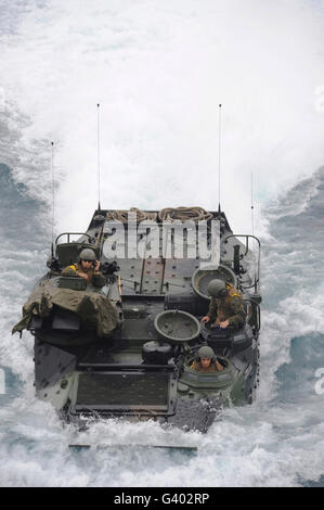 An amphibious assault vehicle approaches the well deck of USS Makin Island. Stock Photo