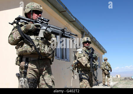 A group of U.S. Army soldiers provide security in Afghanistan. Stock Photo