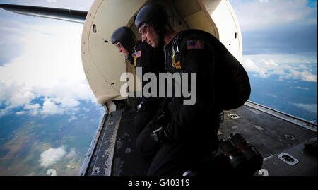 Members of the U.S. Army Golden Knights, monitor wind speeds. Stock Photo