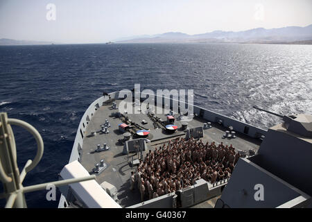 Marines assemble on the forecastle aboard USS San Antonio. Stock Photo