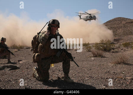Solders are inserted by a CH-53 Super Stallion to the battlefield. Stock Photo