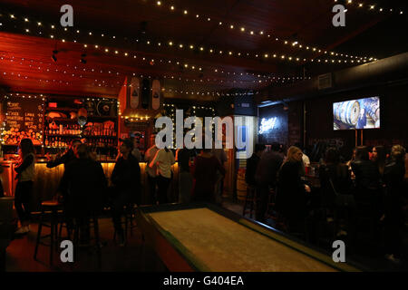 Launch of Smokey’s Cabin, upstairs at Surly’s BBQ and Beer in Surry Hills, Sydney, Australia. 15 June 2016. Stock Photo