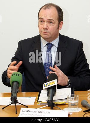 Chief Medical officer Dr Michael McBride speaking at a media briefing in Belfast where it was announced that two adults with no underlying health problems have died from swine flu in Northern Ireland. Stock Photo