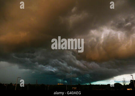 Evening storm clouds rolling in over East London Stock Photo