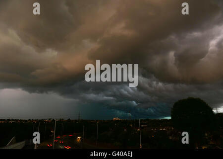 Evening storm clouds rolling in over East London Stock Photo