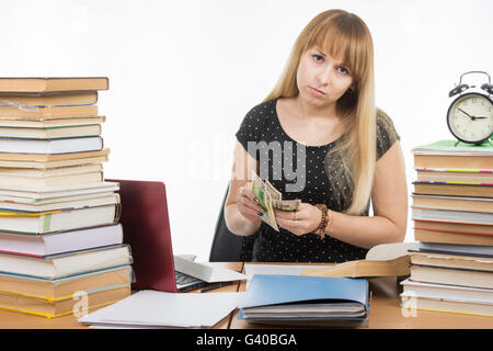 The student said last money to pay a bribe teacher Stock Photo